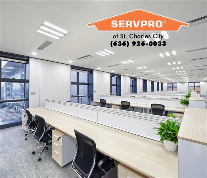 Clean office space with the SERVPRO of St. Charles City logo with phone number in the top right corner