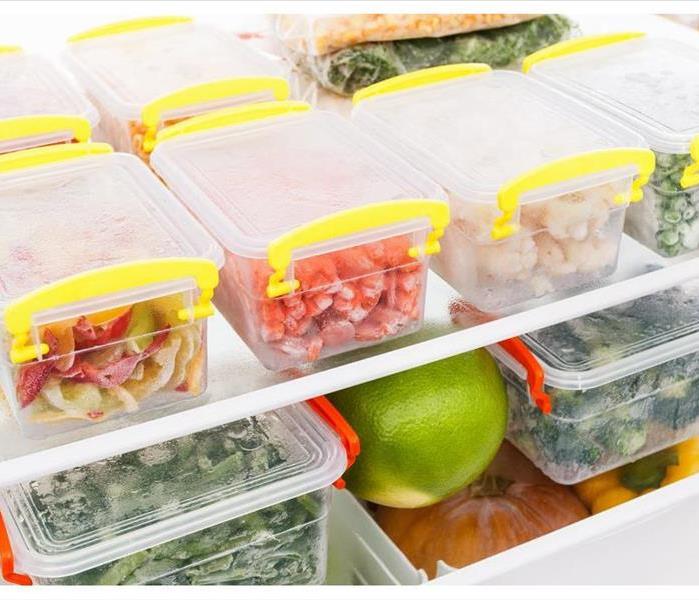 Food in containers inside a refrigerator